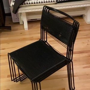 4 black postmodern belotti straps chairs